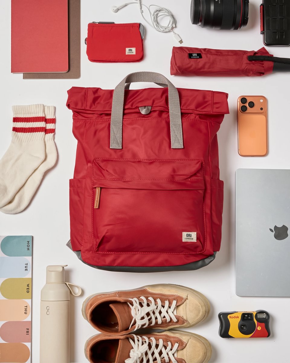 ORI London red backpack flat lay